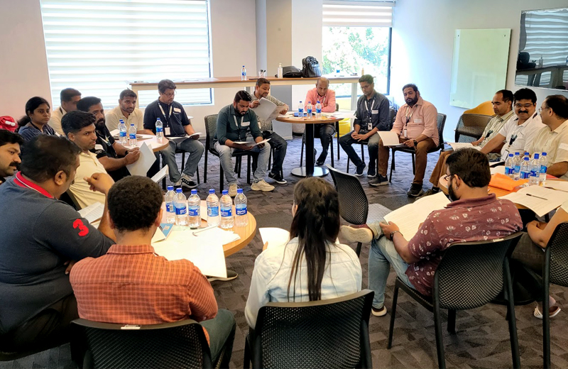 A facilitated group dialogue and discussion in session
